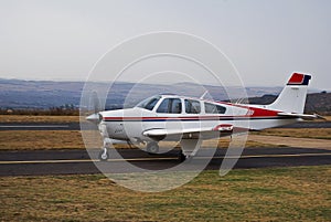 Beechcraft Bonanza takeoff photo