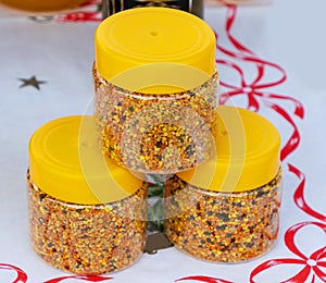 Beee polen granules in plastic containers