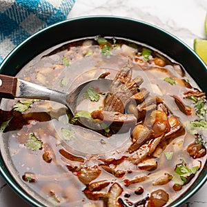 Beef birria consomme with chickpeas. Mexican food