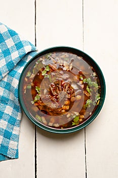 Beef birria consomme with chickpeas. Mexican food