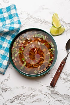 Beef birria consomme with chickpeas. Mexican food