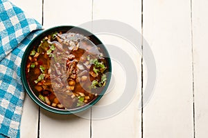 Beef birria consomme with chickpeas. Mexican food