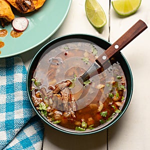 Beef birria consomme with chickpeas. Mexican food