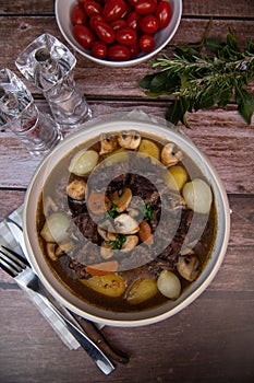 Beef bourguignon recipe, beef stew with wine sauce and vegetables