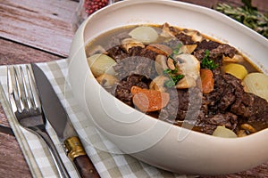 Beef bourguignon recipe, beef stew with wine sauce and vegetables