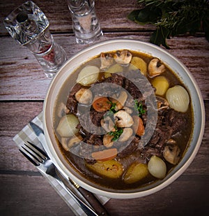 Beef bourguignon recipe, beef stew with wine sauce and vegetables