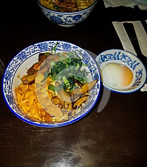 Beef brisket rice bowl with soft boiled egg as a side dish photo