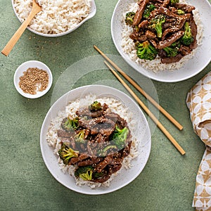Beef and broccoli stir fry served over rice