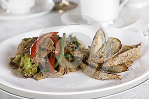 Beef and broccoli stirfry on table