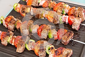 Beef brochette on plancha grill