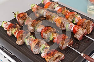 Beef brochette on plancha grill