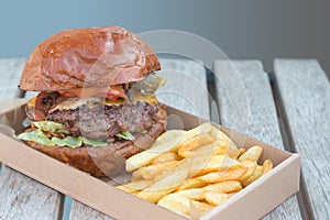 Beef burger and fries photo