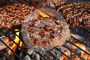 Beef burger for hamburger on barbecue flame grill