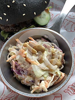 Beef burger and vegetable salad