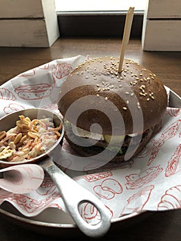 Beef burger and vegetable salad