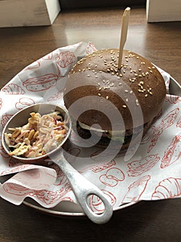 Beef burger and vegetable salad