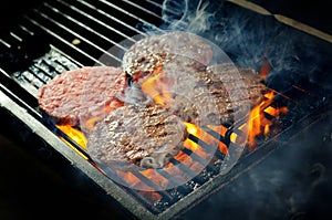Beef burgers being cooked