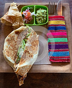 Beef burrito wrap with guacamole and Pico De Gallo