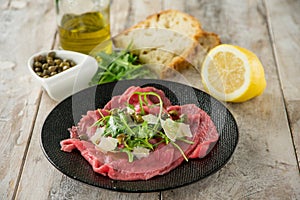 Beef carpaccio with arugula