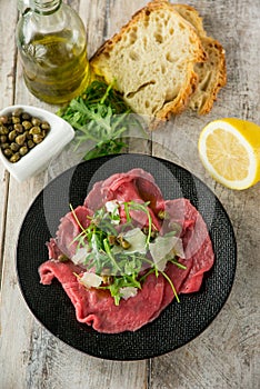 Beef carpaccio with arugula