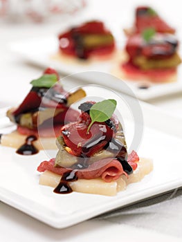 Beef Carpaccio bites on parmesan