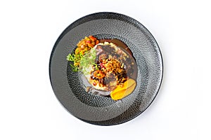Beef cheeks with couscous risotto and vegetables isolated