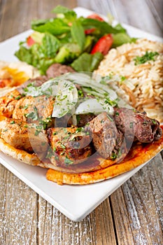 beef and chicken kabob plate