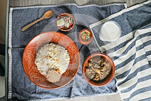 Beef Chui Jhal Combo with pulao rice, shami kabab, korma karahi, kala buna, boondi rabri, borhani and salad served in dish