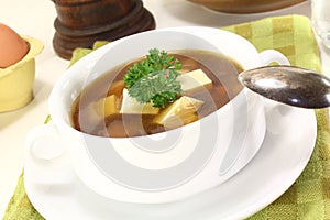 Beef consomme with egg