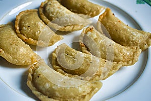 Beef Empanadas. Traditional food. Empanadas are crescent-shaped, savory pastries made of dough and filled with a variety of