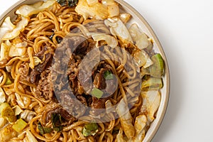 Beef fried noodles on white background