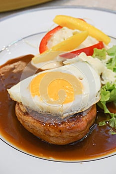 Beef Hamburg steak with egg.