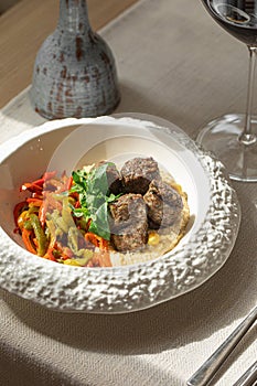 Beef kufte with hummus and roasted vegetables