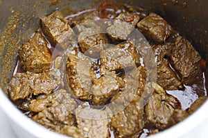 Beef madras curry cooking photo