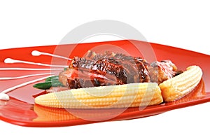 Beef meat served with corns