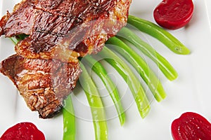 Beef meat served on white