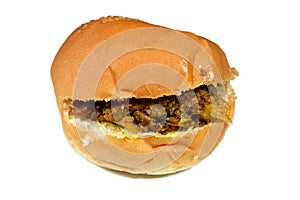 Beef meat shawarma sandwich in a sesame bun, a popular Middle Eastern dish that originated in the Ottoman Empire, meat cuts into
