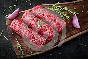 Beef minced meat sausages. Fresh raw meat