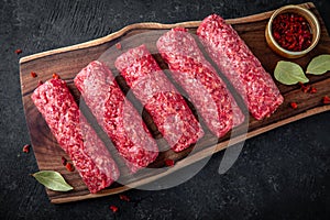 Beef minced meat sausages. Fresh raw meat