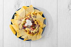 Beef nachos with jalapeno, olives, tomato, beans cheddar cheese