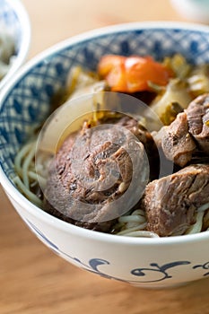 Beef noodle soup. Taiwanese famous food in a bowl on wooden table