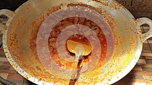 Beef Rendang food being cooked. one of the popular traditional Indonesian foods