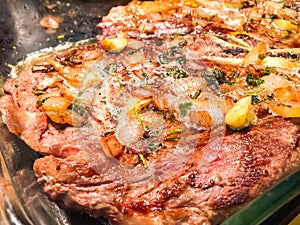 Beef Rib-Eye Steaks with Roasted Garlic