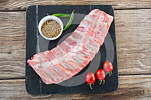 Beef ribs, chillies, cherry tomatoes and coriander seeds
