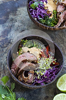 Beef with rice, red cabbage and broccoli