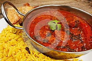 Beef rogan josh in balti dish with rice