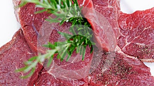 Beef with rosemary sprigs