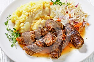 Beef rouladen with potato mash and sauerkraut photo