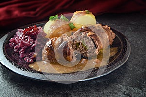 Beef roulades, traditional german meal, filled meat rolls with r