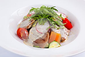 Beef salad with greens and vegetables